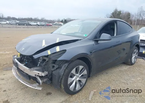 2022 Tesla Model Y Long Range Dual Motor All-Wheel Drive z USA, uszkodzony, nr VIN 7SAYGDEE2NA018857
